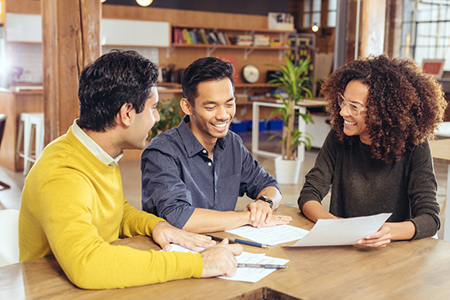 Couple working with one of the best real estate agents